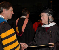Professor Charity Scott
