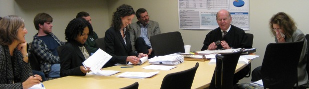 Judge Stuart Foss presides over a moot hearing with HeLP Clinic students