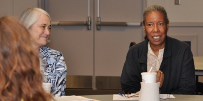 Journal Club members Charity Scott and Leslie Jackson